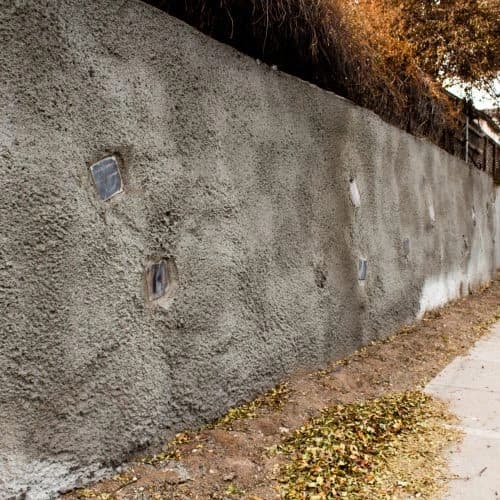 Shotcrete retaining wall with tieback anchors along a Colorado property